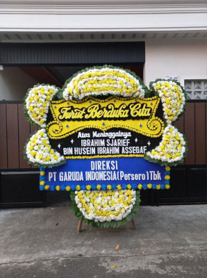Papan Bunga Duka di Wonawa