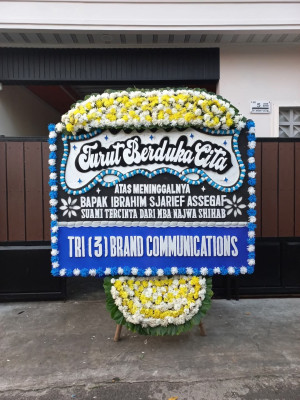 Papan Bunga Duka di Wonawa
